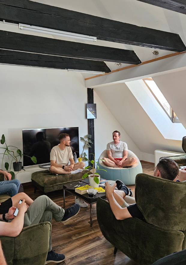 Indie makers talking during a small living-room meetup